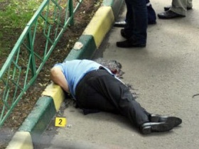 Тело Юрия Буданова на месте убийства. Фото: AFP